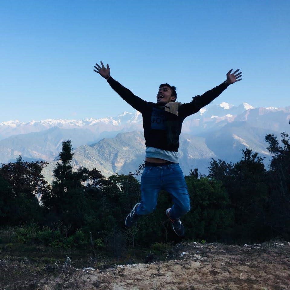 Anshul dawar jumping in the Himalayas